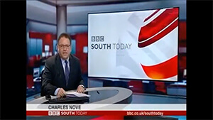 Charles Nove presenting BBC TV South Today news.